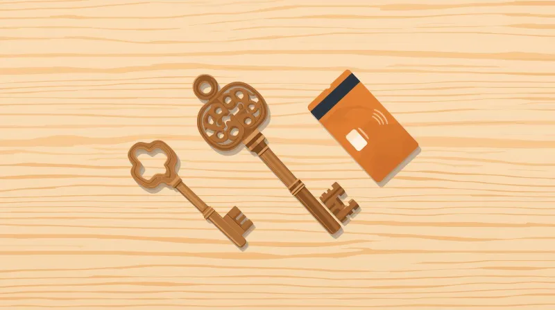 An ornate traditional key and a modern keycard on a wooden table representing the WordPress LMS vs Teachable trade-off between ownership and convenience